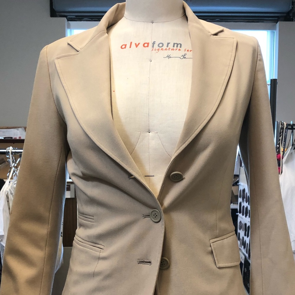 Cream blazer. Perfect for work!
